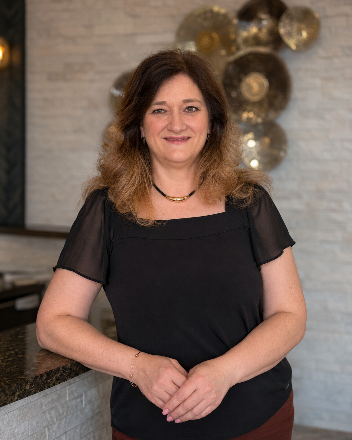 Jetz Hair and Nails Studio team member welcoming clients in Edmonton